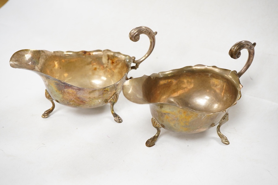 Sundry silver, consisting of - a pair of George V sauce boats, S. Blanckensee & Sons Ltd, Birmingham, 1936, a George III marrow scoop, Peter & Ann Bateman, London, 1793, a Victorian Scottish Kings pattern sauce ladle, te
